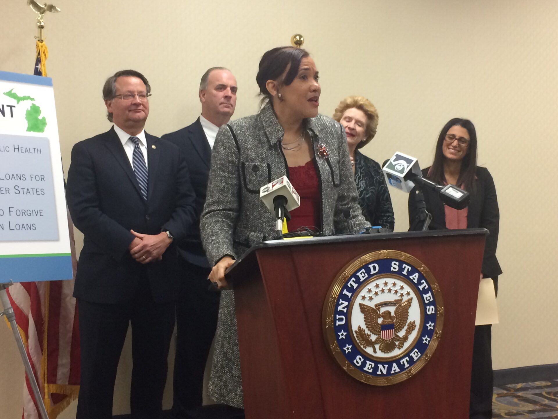 Key players for Flint celebrate federal funds, pledge speedy pipe replacement
