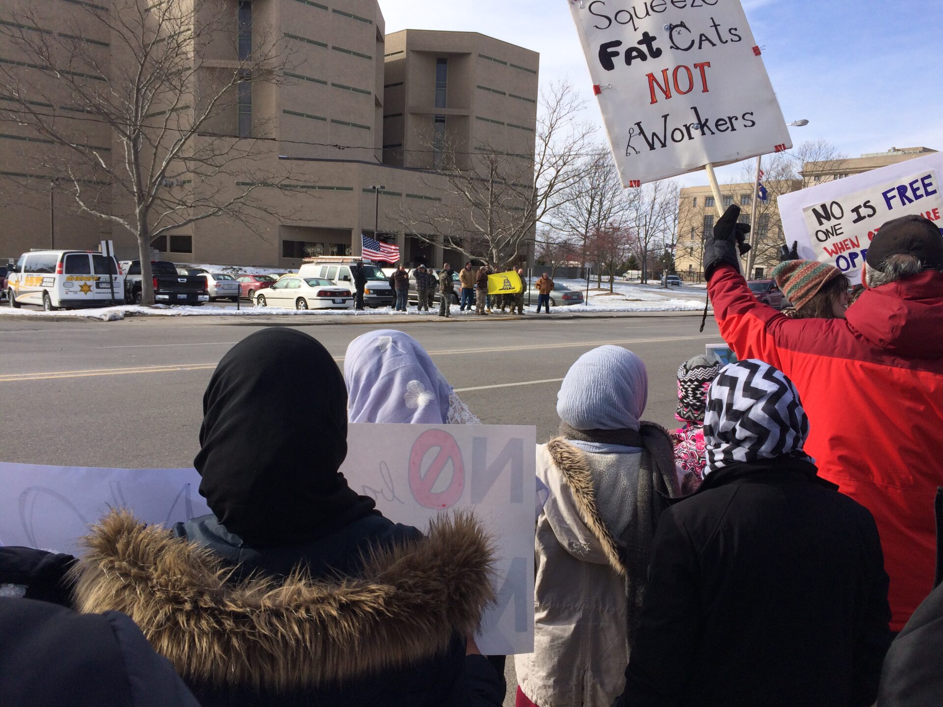 Flint rally, march call out “You are welcome here” and  “This is what democracy looks like”