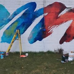 International and local artists collaborate to brighten bookstore’s walls, city’s image