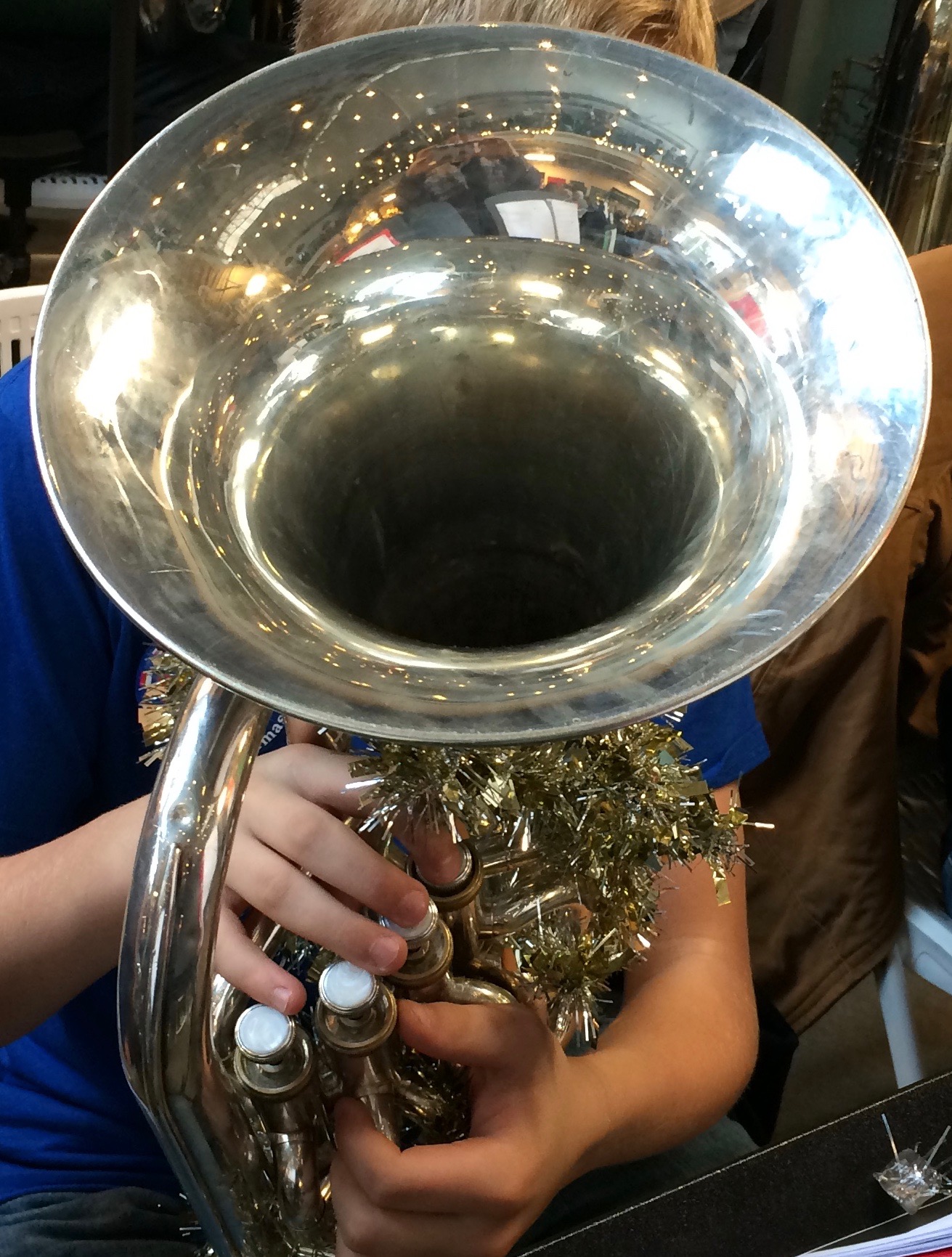 Village Life:  85 tubas and a corny sing-a-long one secret to holiday cheer