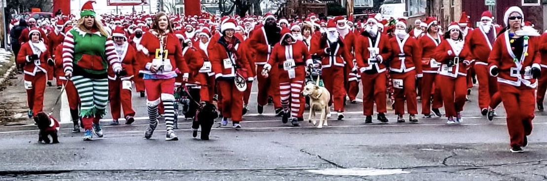 Holiday season kicks off with “red wave” Santa Run downtown