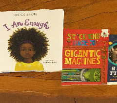 Kids swarm City Hall to read books with Weaver and Howard University spring break students