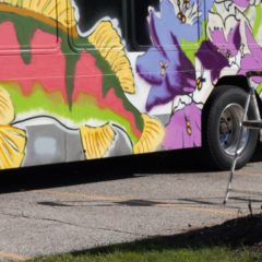 Flint muralist creates bus mural celebrating poet Theodore Roethke