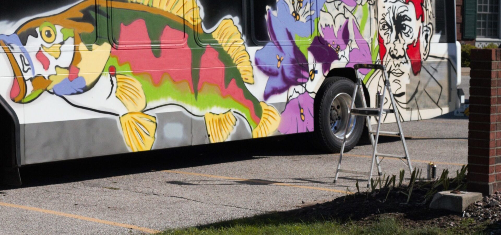 Flint muralist creates bus mural celebrating poet Theodore Roethke