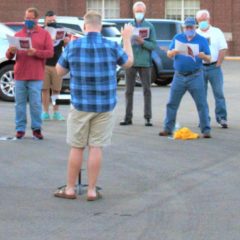 Harmonious voices rise from the parking lot: local choir meets to safely socialize and sing
