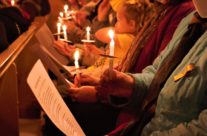 Ukrainian community gathers to offer prayers and songs for the “homeland” at candlelight vigil