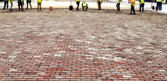 Village Life: the ballet of brick laying